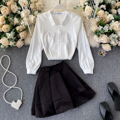 Γυναικείο μοντέρνο καθημερινό σετ από δύο μέρη σε λευκό και μαύρο χρώμα