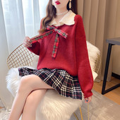 Naiste komplekt kaheosalisest kampsunist ja seelikust