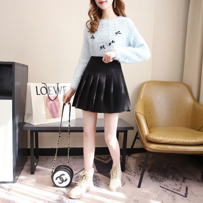 Set de dama modern de pulover + fusta