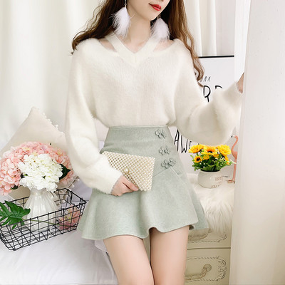 Κομψό γυναικείο σετ από δύο μέρη - πουλόβερ και φούστα με ψηλή μέση