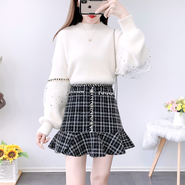 Moodne kampsuni ja tviidseeliku komplekt