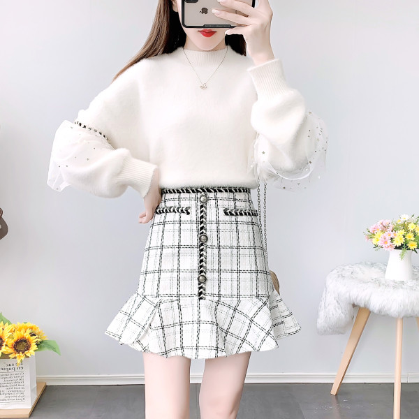 Moodne kampsuni ja tviidseeliku komplekt