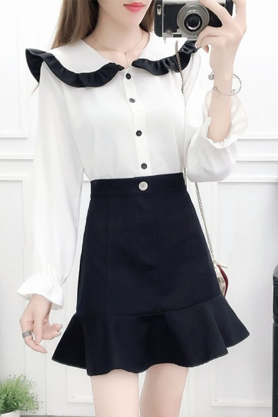 Moderan ženski komplet košulje okruglog dekoltea i suknje visokog struka