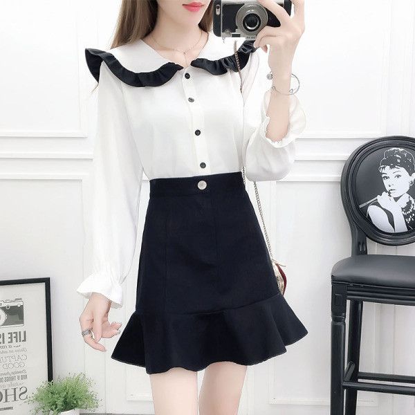 Moderan ženski komplet košulje okruglog dekoltea i suknje visokog struka