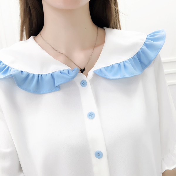 Moderan ženski komplet košulje okruglog dekoltea i suknje visokog struka