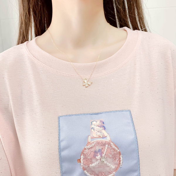 Komplet majica kratkih rukava s aplikacijom i suknja s gumbima