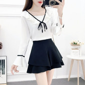 Naiste vabaaja komplekt kaheosalisest lootosevarrukate ja väljalõigatud seelikuga pluusist