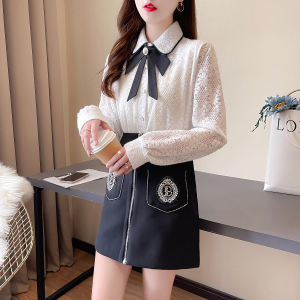 Novi model proljetnog kompleta čipkane košulje i suknje sa patentnim zatvaračem