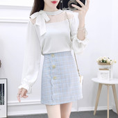 Naiste kaheosaline komplekt, mis sisaldab särki ja kõrge vöökohaga seelikut