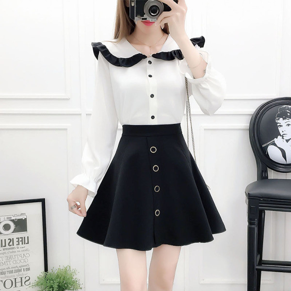 Moderan ženski komplet od dva dijela košulje s okruglim izrezom i izrezane suknje