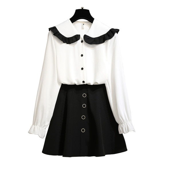 Moderan ženski komplet od dva dijela košulje s okruglim izrezom i izrezane suknje