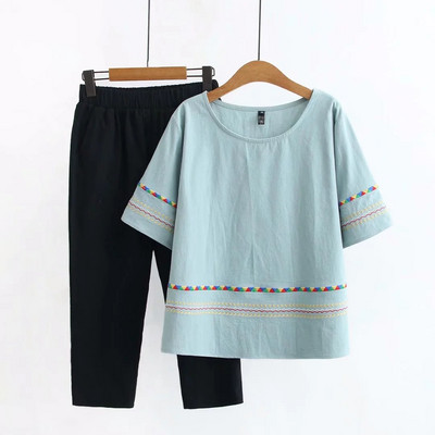 Moodne naiste komplekt tikandi ja ovaalse kaelusega