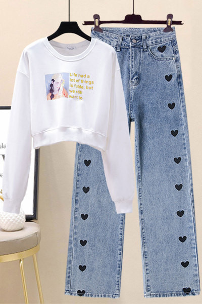 Juhuslik naiste prindiga pluus ja tikandiga teksad