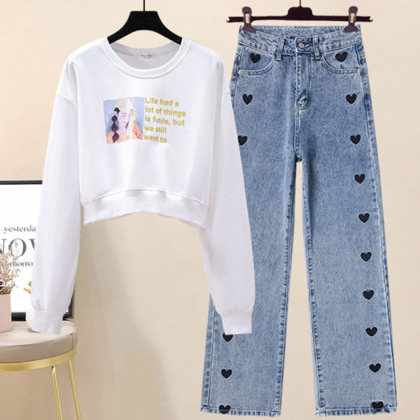 Juhuslik naiste prindiga pluus ja tikandiga teksad