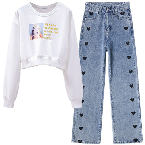 Juhuslik naiste prindiga pluus ja tikandiga teksad