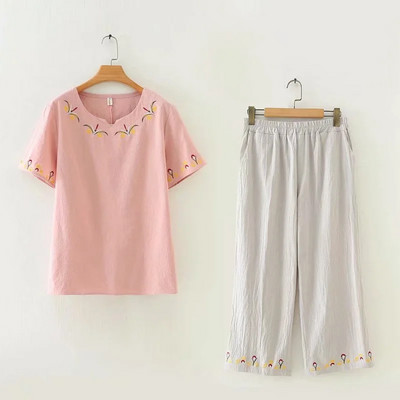 Naiste vabaaja komplekt roosa ja sinise tikandiga