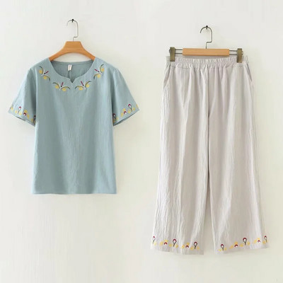 Naiste vabaaja komplekt roosa ja sinise tikandiga