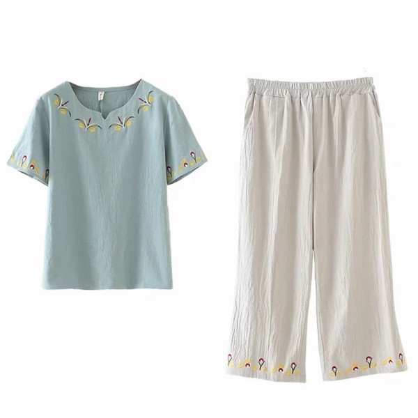 Naiste vabaaja komplekt roosa ja sinise tikandiga