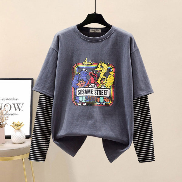 Moodne naiste ümara kaelusega pluusi ja teksadega komplekt