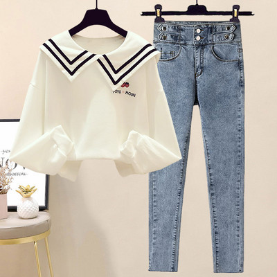 Uue mudeli naiste tikandiga pluusikomplekt ja teksad