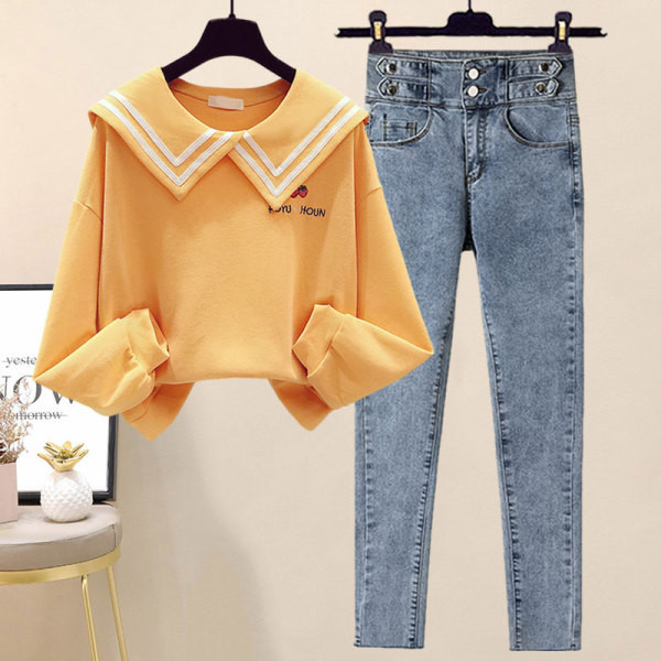 Uue mudeli naiste tikandiga pluusikomplekt ja teksad