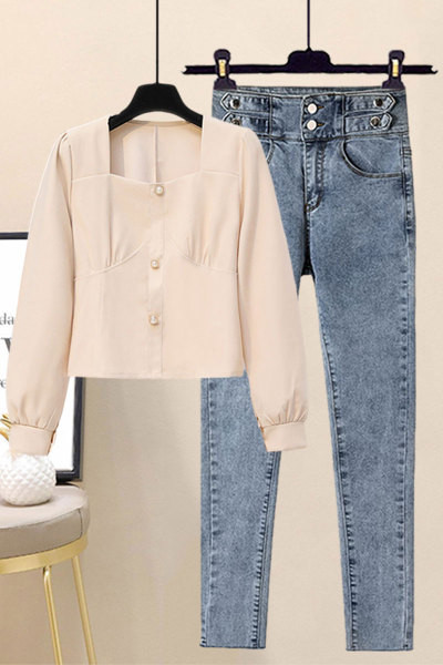 Moodne naiste pärlitega pluus ja pikad teksad