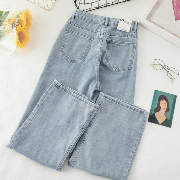 Platus moteriškų ilgų džinsų su sagomis modelis