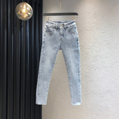 Sinist värvi tasku ja kõrge vöökohaga naiste teksad