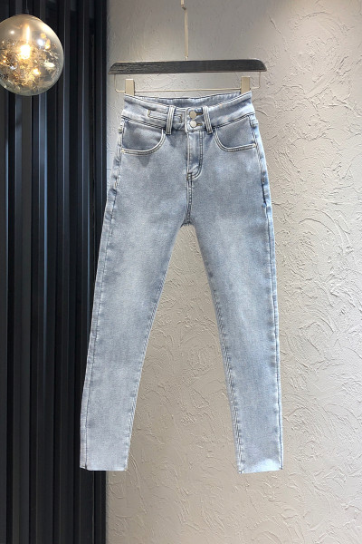 Sinist värvi tasku ja kõrge vöökohaga naiste teksad