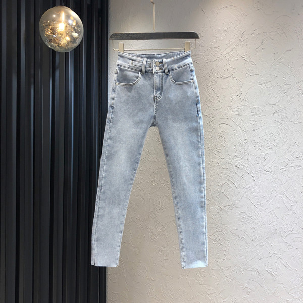 Sinist värvi tasku ja kõrge vöökohaga naiste teksad