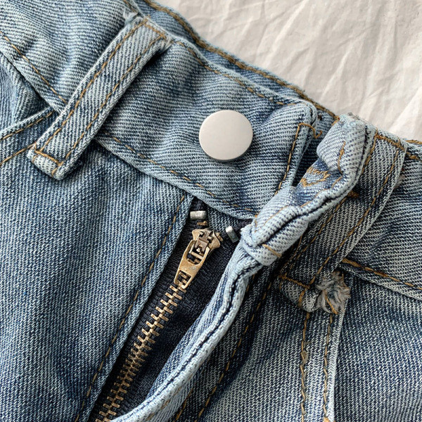 Naiste teksapükste lai taskutega mudel