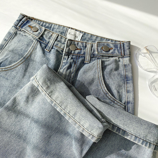 Naiste vabaaja teksapükste lai nööpidega mudel