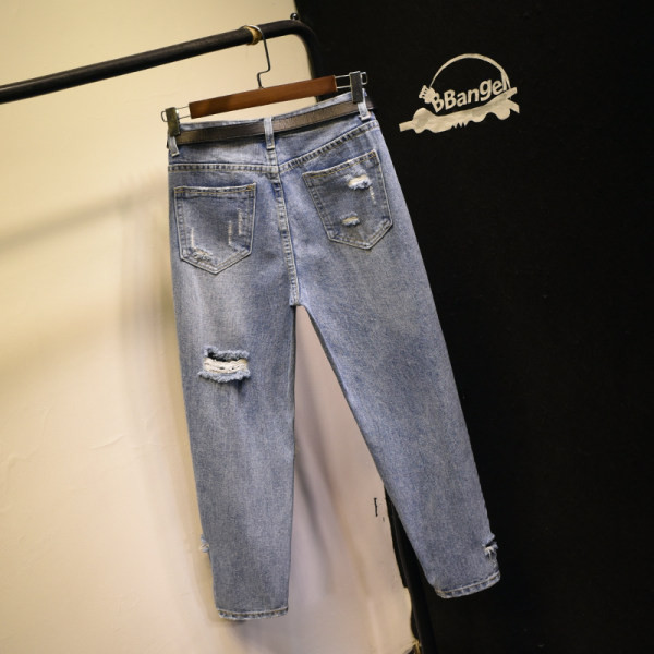 Široke ženske traperice - s visokim strukom i poderanim motivima