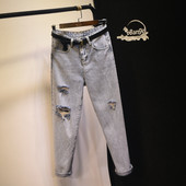 Uus kõrge vöökoha ja rebenenud motiividega naiste vabaaja teksapükste mudel