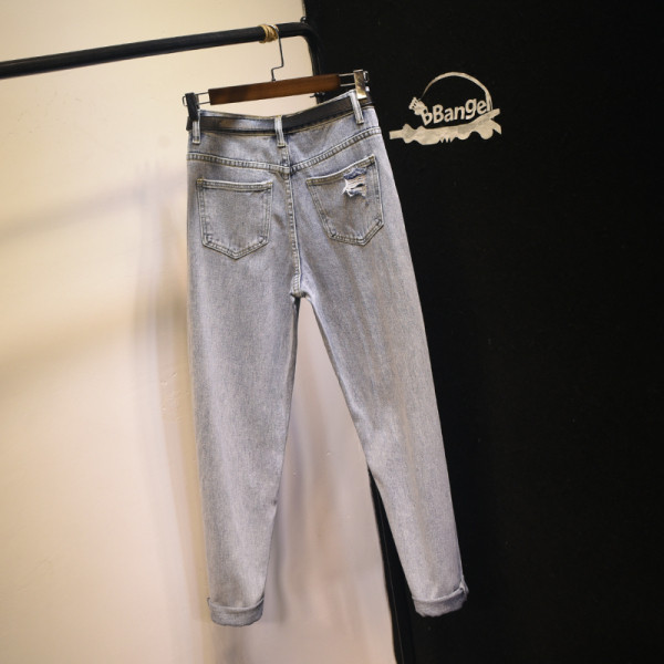 Uus kõrge vöökoha ja rebenenud motiividega naiste vabaaja teksapükste mudel