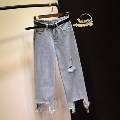 Moodsad naiste asümmeetrilised rebenenud motiividega teksad