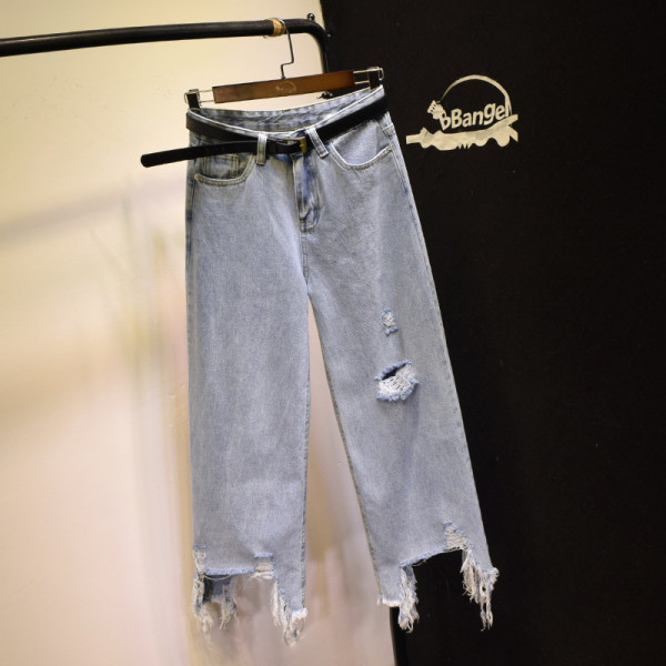 Moodsad naiste asümmeetrilised rebenenud motiividega teksad