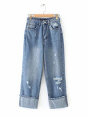 Široke traperice s manžetom i poderanim motivima