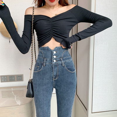 Naiste kõrge vöökoha ja nööpidega teksad