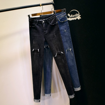 Uus rebenenud kõrge vöökoha motiividega naiste teksapükste mudel