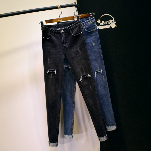 Uus rebenenud kõrge vöökoha motiividega naiste teksapükste mudel