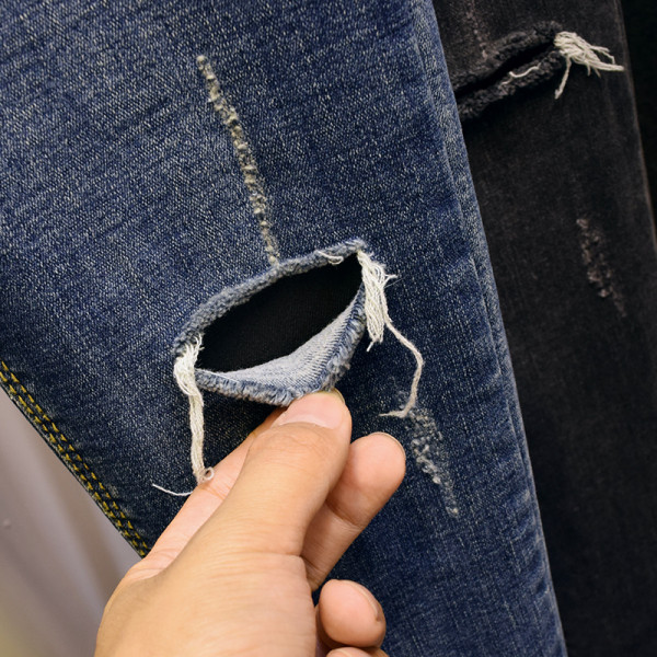 Uus rebenenud kõrge vöökoha motiividega naiste teksapükste mudel