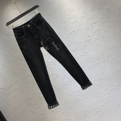 Дамски дънки в черен цвят с джоб и висока талия