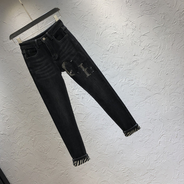 Дамски дънки в черен цвят с джоб и висока талия