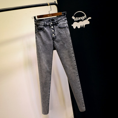 Õhukese mudeli naiste nööpidega teksad – kõrge vöökoht