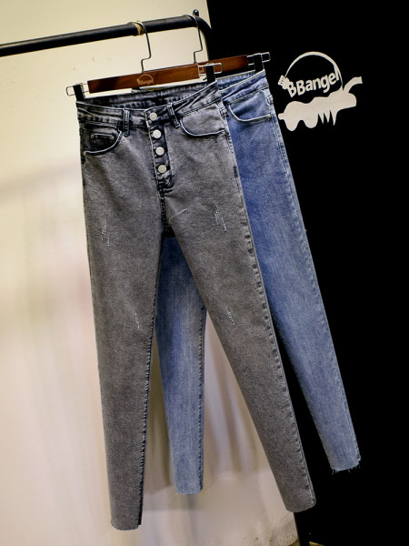 Õhukese mudeli naiste nööpidega teksad – kõrge vöökoht