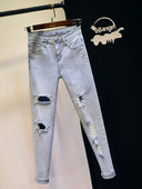 Ежедневни дамски дънки с висока талия и скъсани мотиви - син цвят