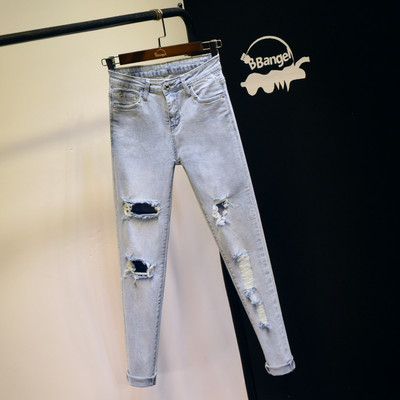 Ежедневни дамски дънки с висока талия и скъсани мотиви - син цвят