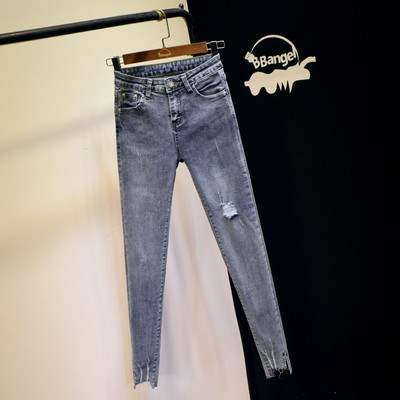 Дамски дънки Slim модел със скъсани мотиви