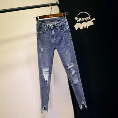 Kõrge vöökoha ja rebenenud motiividega vabaaja naiste teksad - Slim mudel